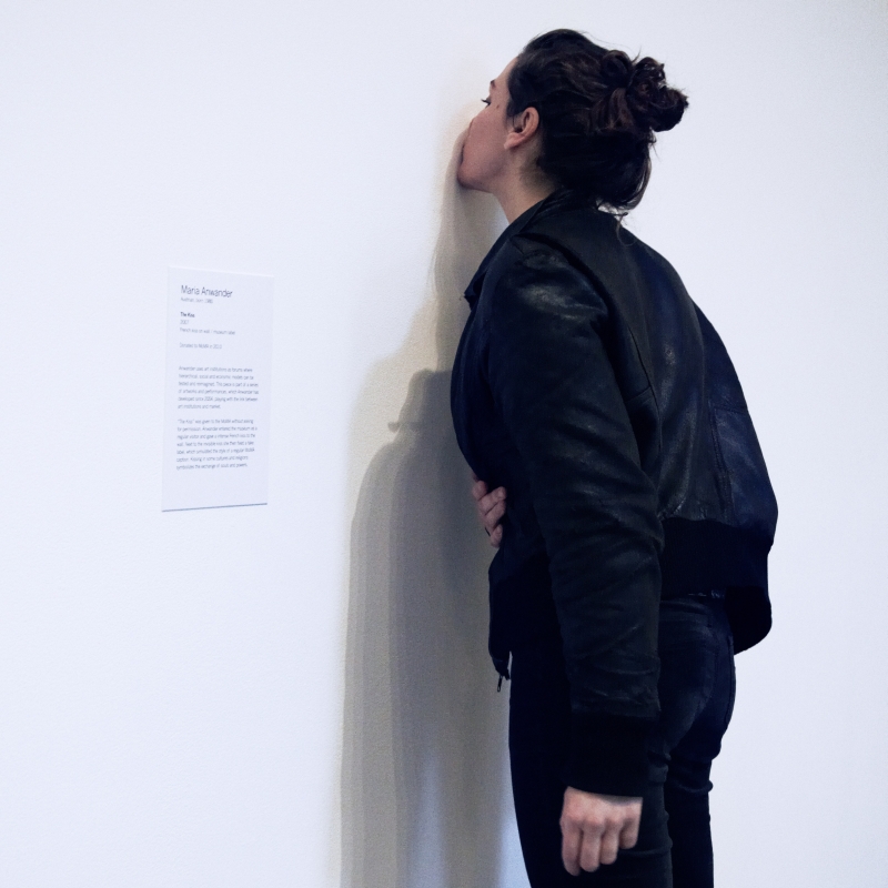 The Kiss, 2007–2010, Maria Anwander. French kiss on wall and museum label.