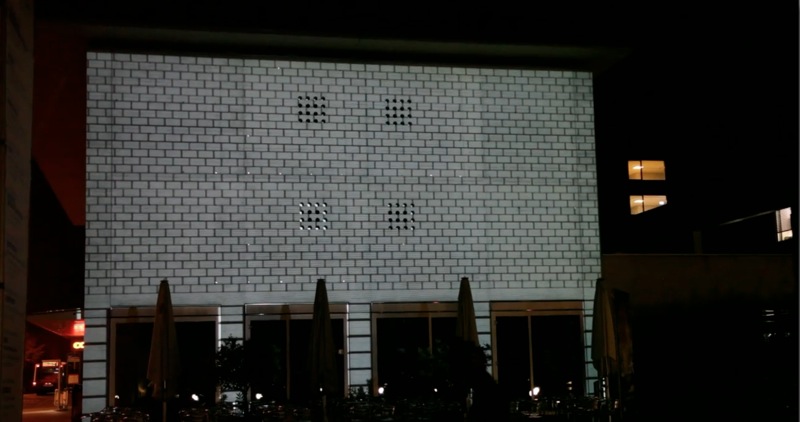 Architectural projection by ETH Zurich students, October 2012. “Change of material” simulated with a projection on a concrete façade by Mario Campi at ETH Zurich, Science City Campus. Image © Lukas Treyer, 2012. Used with permission.